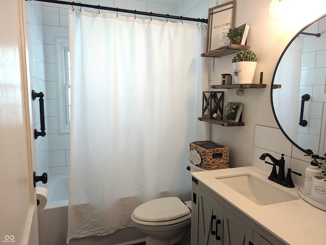 3236 Spruce St, Columbus, IN 47203 - full bathroom featuring vanity and shower / bath combo with shower curtain