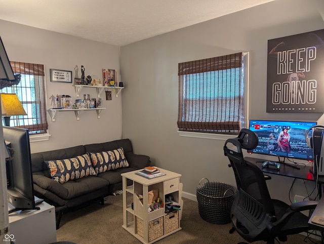 3236 Spruce St, Columbus, IN 47203 - carpeted living room featuring an office area and baseboards