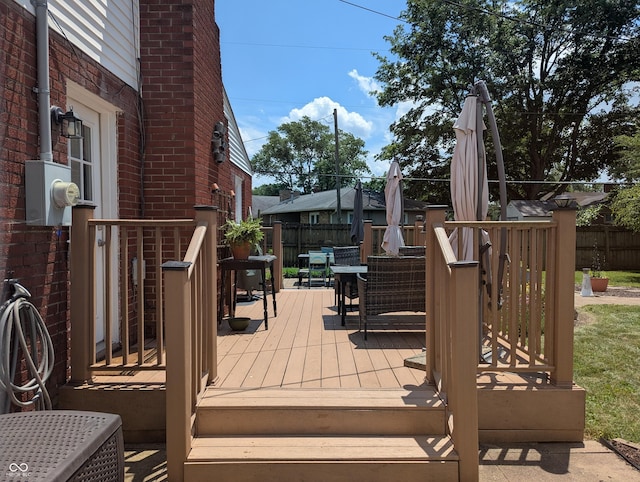3236 Spruce St, Columbus, IN 47203 - wooden deck featuring outdoor dining space
