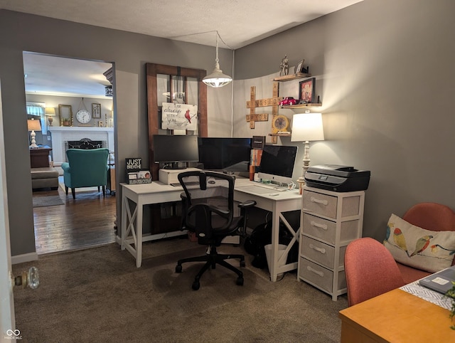 3236 Spruce St, Columbus, IN 47203 - home office featuring a fireplace and dark carpet