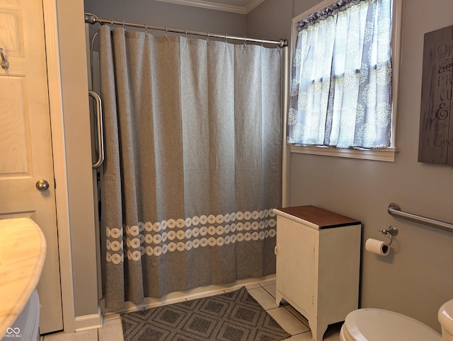 3236 Spruce St, Columbus, IN 47203 - bathroom featuring a shower with shower curtain, ornamental molding, and tile patterned floors