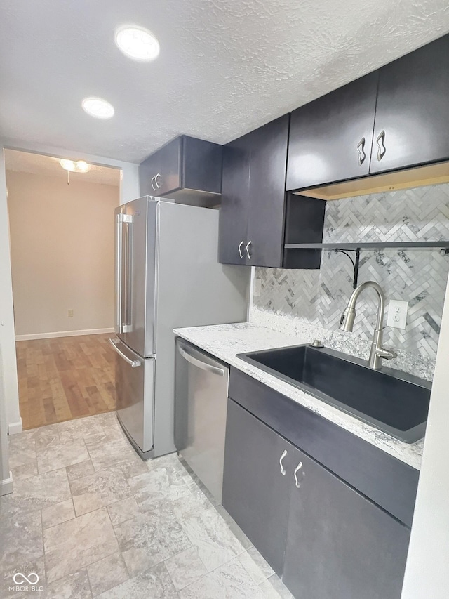 2975 Two Worlds Dr, Columbus, IN 47201 - kitchen with stainless steel dishwasher, backsplash, and open shelves