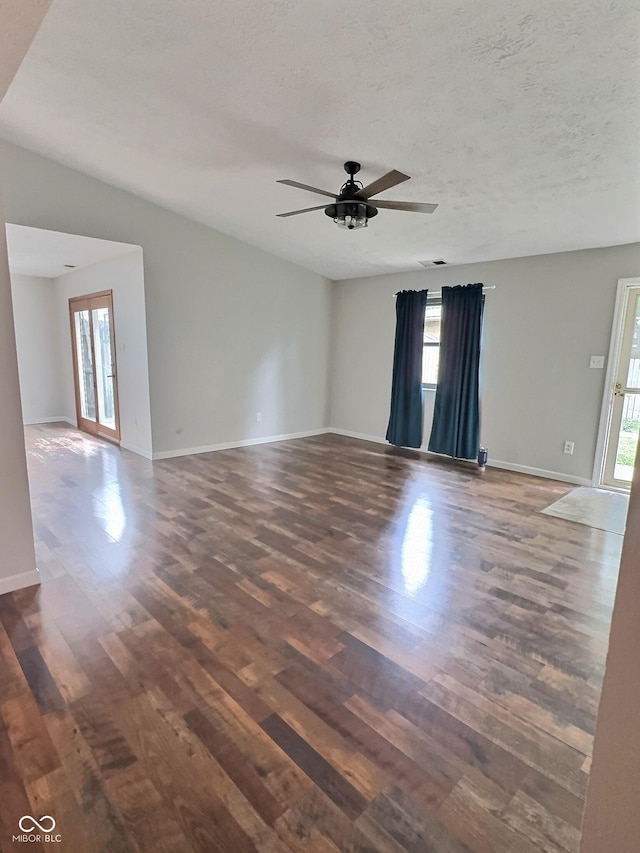 2975 Two Worlds Dr, Columbus, IN 47201 - unfurnished room with wood finished floors, ceiling fan, and a textured ceiling