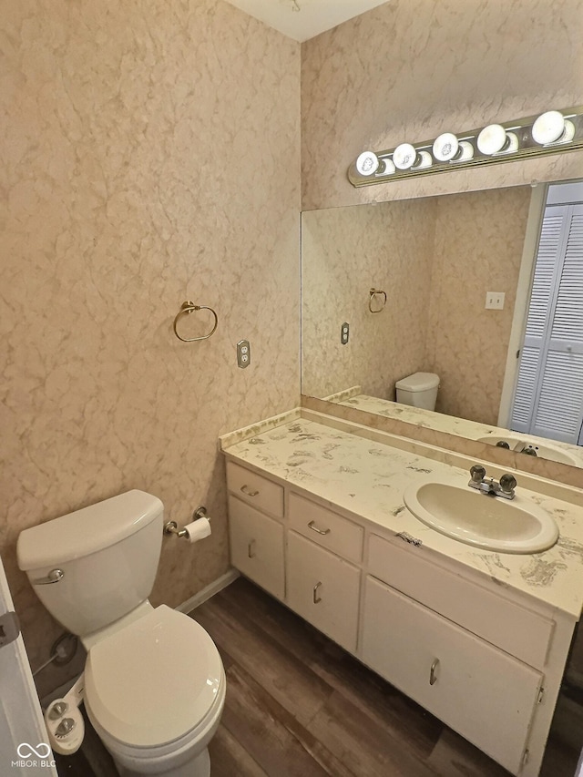 2975 Two Worlds Dr, Columbus, IN 47201 - bathroom with wood finished floors and vanity