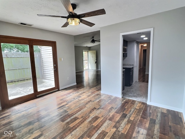 2975 Two Worlds Dr, Columbus, IN 47201 - unfurnished room with wood finished floors and a ceiling fan