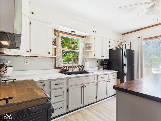 5282 W 900 N, Frankton, IN 46044 - kitchen with open shelves, freestanding refrigerator, a ceiling fan, and white cabinets