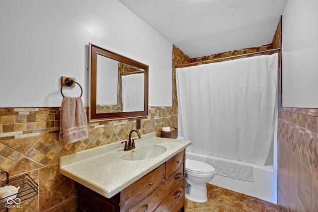 9970 N Brown Ln, Gosport, IN 47433 - bathroom featuring tile walls, vanity, and shower / bath combo with shower curtain