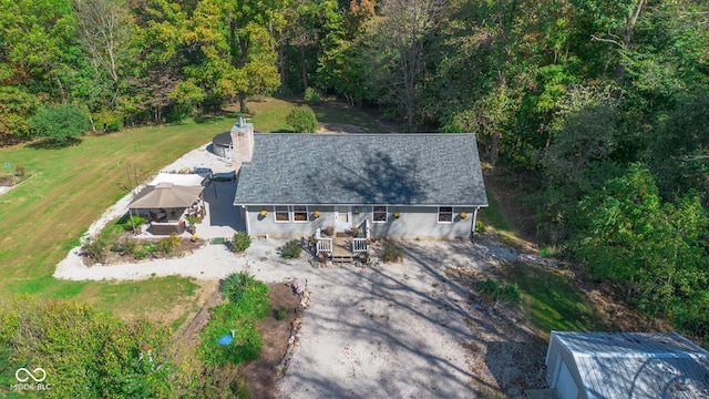 9970 N Brown Ln, Gosport, IN 47433 - aerial view of property and surrounding area featuring a heavily wooded area