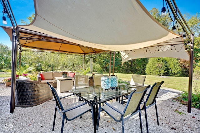 9970 N Brown Ln, Gosport, IN 47433 - view of patio with a gazebo, outdoor dining area, and an outdoor hangout area