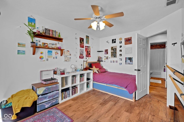 9970 N Brown Ln, Gosport, IN 47433 - bedroom featuring wood finished floors and a ceiling fan