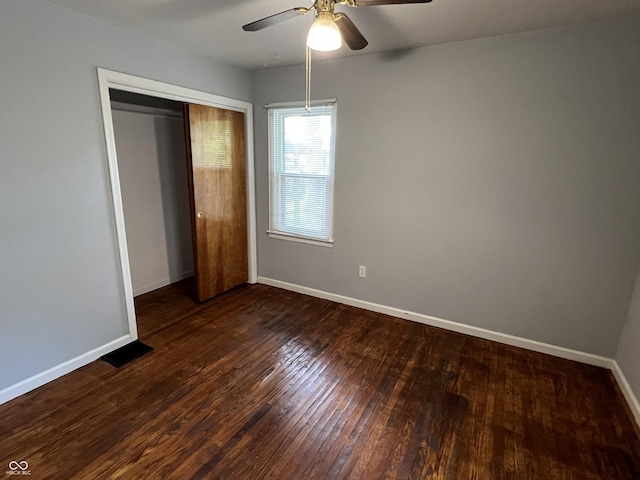 1726 N Linwood Ave, Indianapolis, IN 46218 - unfurnished bedroom with wood finished floors, a closet, and ceiling fan