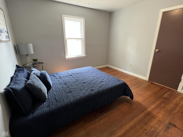 1726 N Linwood Ave, Indianapolis, IN 46218 - bedroom featuring wood finished floors and baseboards