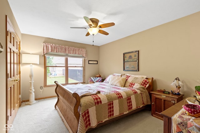 1530 Danaher St, Indianapolis, IN 46217 - bedroom with light colored carpet and ceiling fan