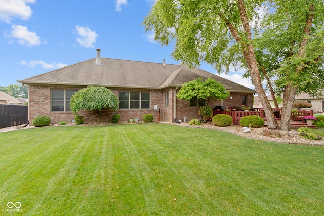 1530 Danaher St, Indianapolis, IN 46217 - view of front of property with brick siding, a deck, and roof with shingles