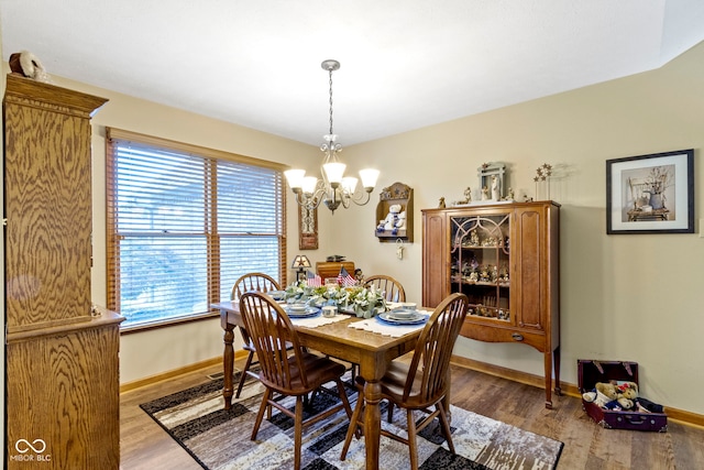 1530 Danaher St, Indianapolis, IN 46217 - dining space with a chandelier and wood finished floors