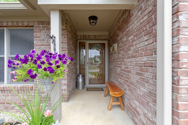 1530 Danaher St, Indianapolis, IN 46217 - doorway to property with brick siding and a porch
