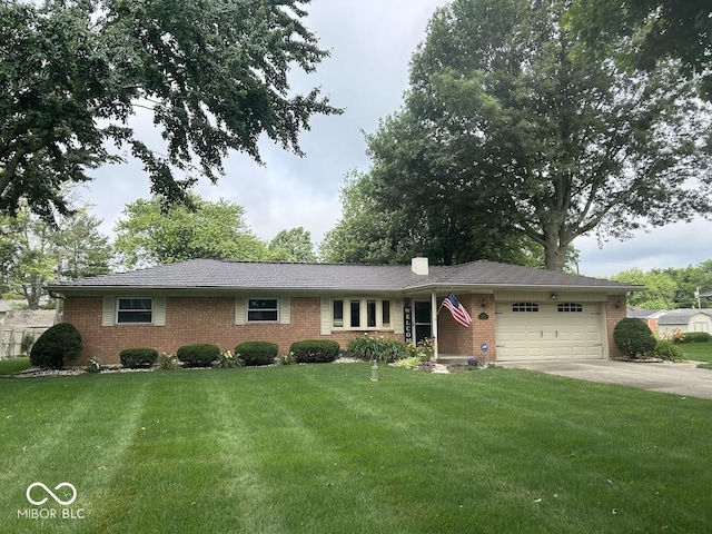 4728 S Eaton Ave, Indianapolis, IN 46239 - ranch-style home featuring brick siding, an attached garage, a front yard, and concrete driveway