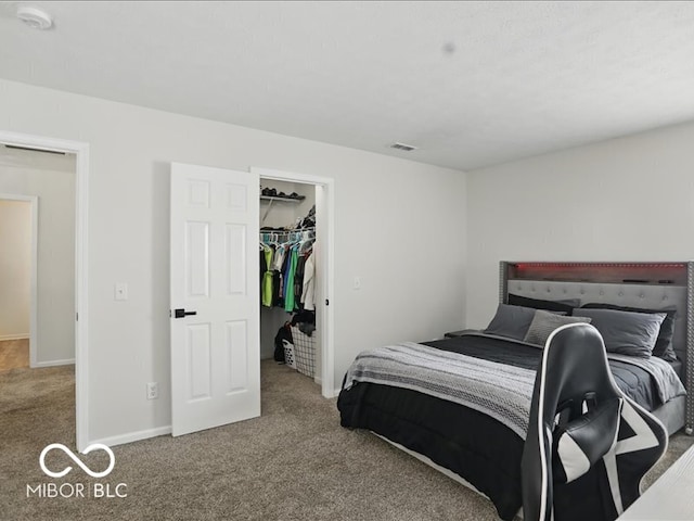 8508 Aviva Ln, Indianapolis, IN 46237 - bedroom with carpet flooring, a walk in closet, and a closet