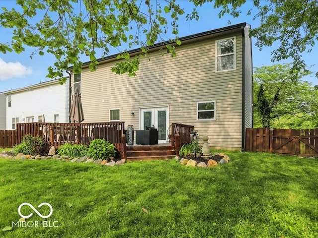 8508 Aviva Ln, Indianapolis, IN 46237 - back of property featuring a deck, a gate, and french doors
