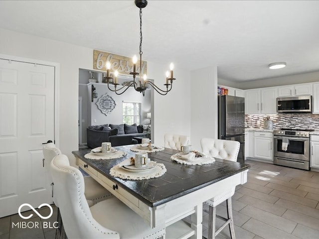 8508 Aviva Ln, Indianapolis, IN 46237 - dining area with a chandelier