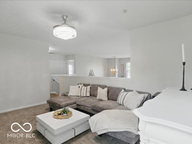 8508 Aviva Ln, Indianapolis, IN 46237 - carpeted living room featuring a chandelier and baseboards