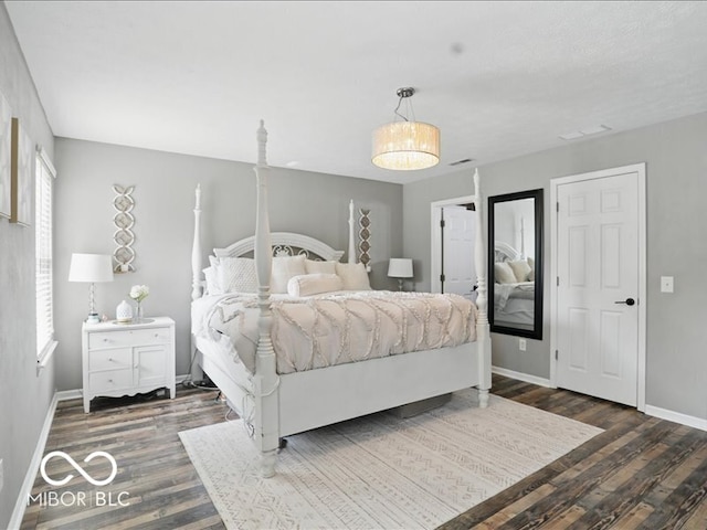 8508 Aviva Ln, Indianapolis, IN 46237 - bedroom featuring dark wood finished floors and baseboards
