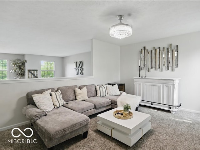 8508 Aviva Ln, Indianapolis, IN 46237 - living room with healthy amount of natural light, carpet, and a chandelier