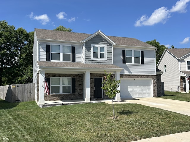 108 Herbert Ct, Trafalgar, IN 46181 - traditional-style home with an attached garage, concrete driveway, covered porch, and roof with shingles