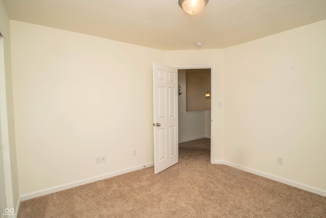 108 Herbert Ct, Trafalgar, IN 46181 - empty room with light carpet and a smoke detector