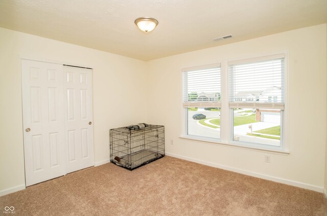 108 Herbert Ct, Trafalgar, IN 46181 - carpeted bedroom featuring baseboards and a closet
