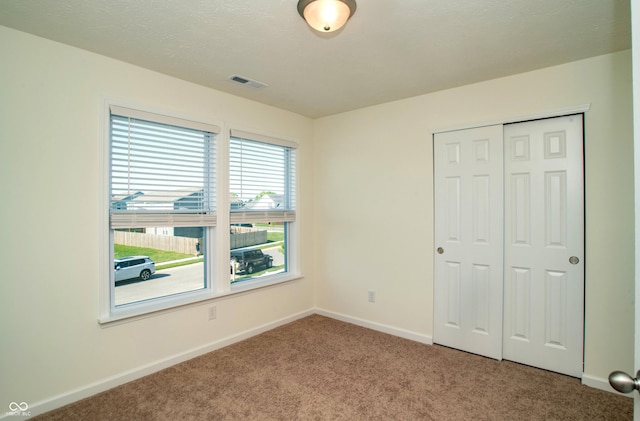 108 Herbert Ct, Trafalgar, IN 46181 - unfurnished bedroom featuring carpet and a closet