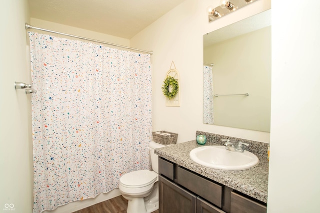 108 Herbert Ct, Trafalgar, IN 46181 - full bathroom featuring vanity, wood finished floors, and curtained shower