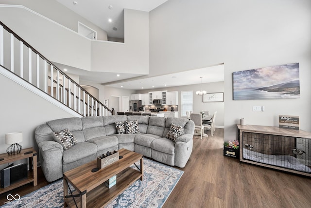 6330 Teakwood Way, Mccordsville, IN 46055 - living room with wood finished floors, stairs, a high ceiling, a chandelier, and recessed lighting