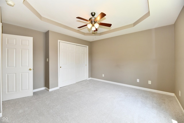 915 E Drybread Ln, Nineveh, IN 46164 - unfurnished bedroom with a raised ceiling, carpet floors, a closet, and ceiling fan