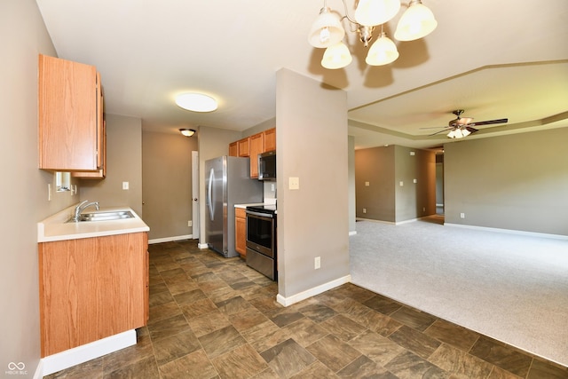 915 E Drybread Ln, Nineveh, IN 46164 - kitchen with appliances with stainless steel finishes, light countertops, a chandelier, ceiling fan, and open floor plan