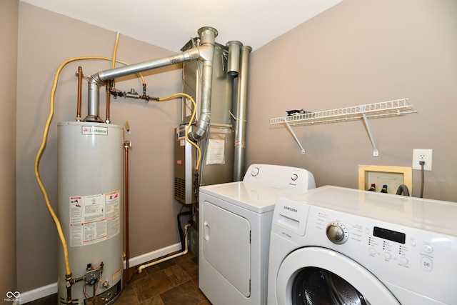 915 E Drybread Ln, Nineveh, IN 46164 - laundry room with water heater, washer and clothes dryer, and stone finish flooring