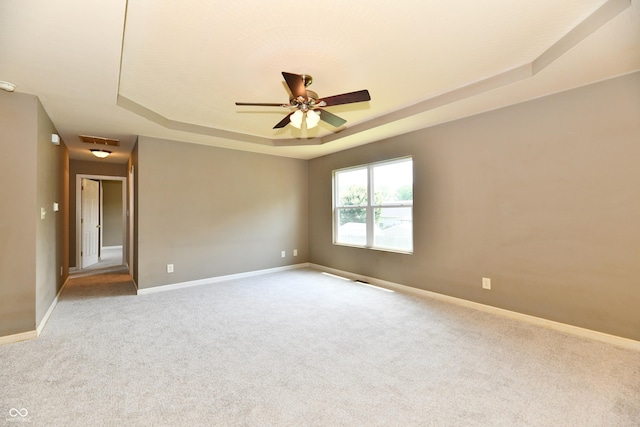 915 E Drybread Ln, Nineveh, IN 46164 - carpeted spare room featuring a tray ceiling, ceiling fan, and a smoke detector