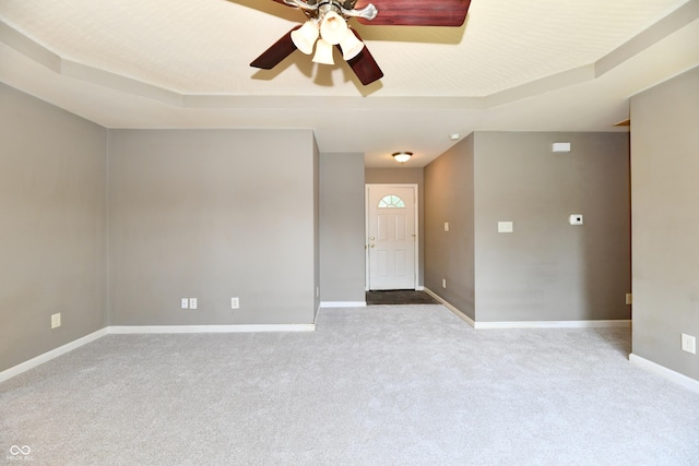 915 E Drybread Ln, Nineveh, IN 46164 - carpeted empty room with a tray ceiling and a ceiling fan