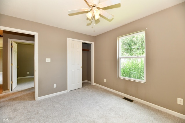 915 E Drybread Ln, Nineveh, IN 46164 - unfurnished bedroom with light carpet, a closet, and a ceiling fan