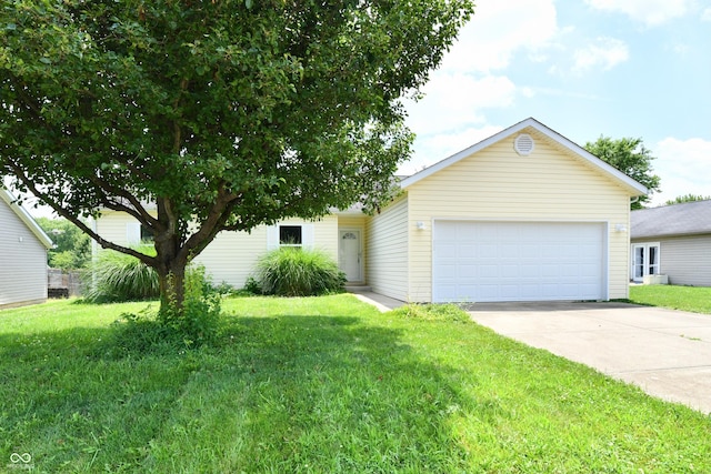 915 E Drybread Ln, Nineveh, IN 46164 - view of front of house featuring a front yard, a garage, and concrete driveway