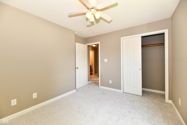 915 E Drybread Ln, Nineveh, IN 46164 - unfurnished bedroom with light carpet, a closet, and a ceiling fan
