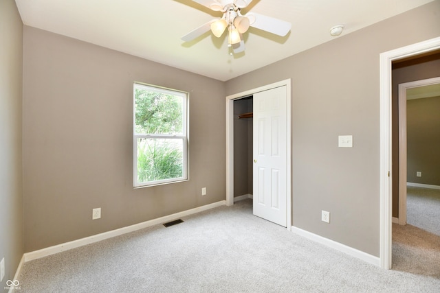 915 E Drybread Ln, Nineveh, IN 46164 - unfurnished bedroom featuring carpet, a closet, and a ceiling fan