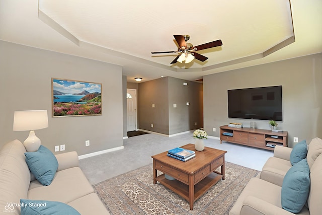 915 E Drybread Ln, Nineveh, IN 46164 - living room featuring a raised ceiling, ceiling fan, and carpet