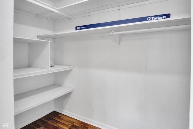 2433 17th St, Columbus, IN 47201 - spacious closet with dark wood-style floors