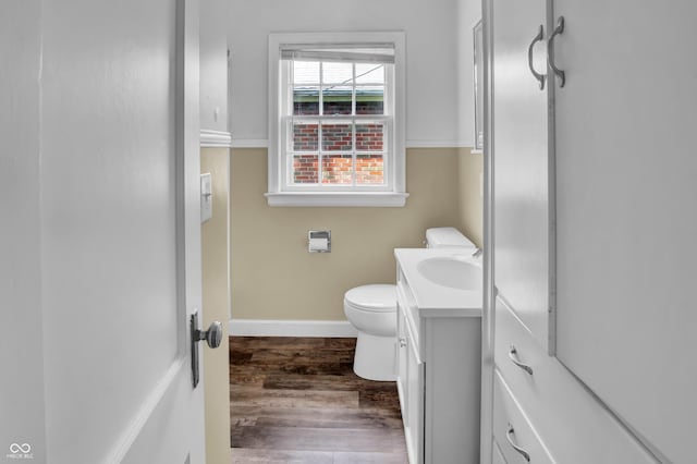 2433 17th St, Columbus, IN 47201 - bathroom with vanity and wood finished floors