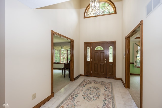 1112 N Dogwood Way, Greenfield, IN 46140 - entrance foyer with a high ceiling and light tile patterned flooring