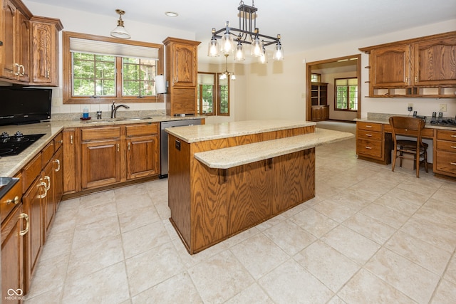 1112 N Dogwood Way, Greenfield, IN 46140 - kitchen with stainless steel dishwasher, brown cabinets, and a kitchen island