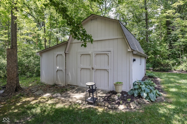 1112 N Dogwood Way, Greenfield, IN 46140 - view of shed featuring a wooded view