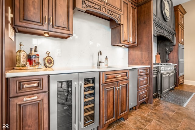 3075 Hurricane Rd, Franklin, IN 46131 - kitchen featuring beverage cooler, light countertops, stainless steel appliances, and brown cabinetry
