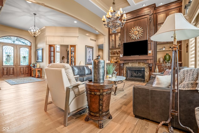 3075 Hurricane Rd, Franklin, IN 46131 - living area featuring a chandelier, ornamental molding, a high end fireplace, light wood-style floors, and recessed lighting